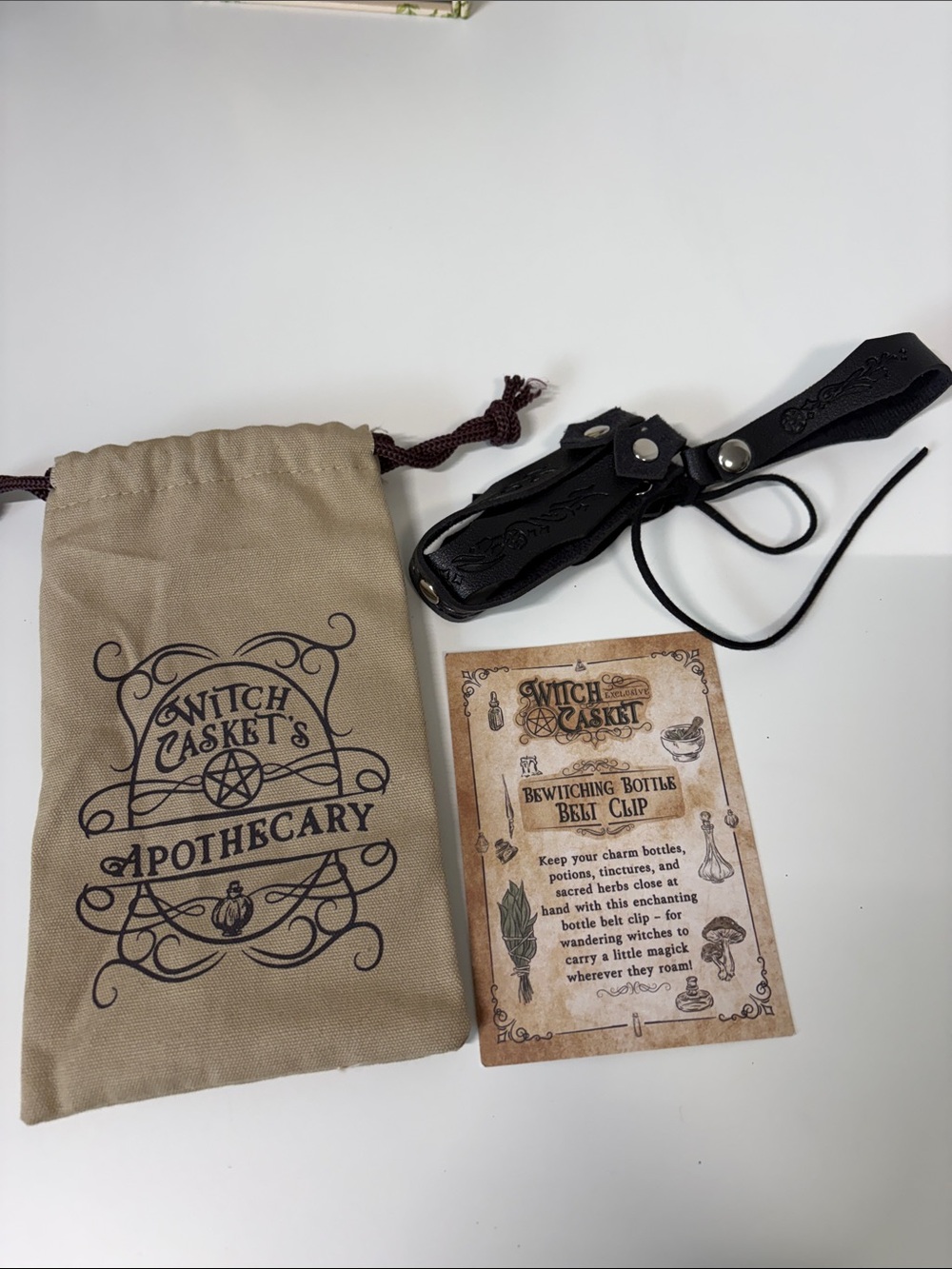 Witch casket bottle belt clip